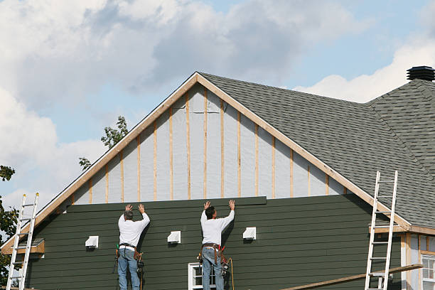 Professional Siding Contractor technician working in Skippack, PA
